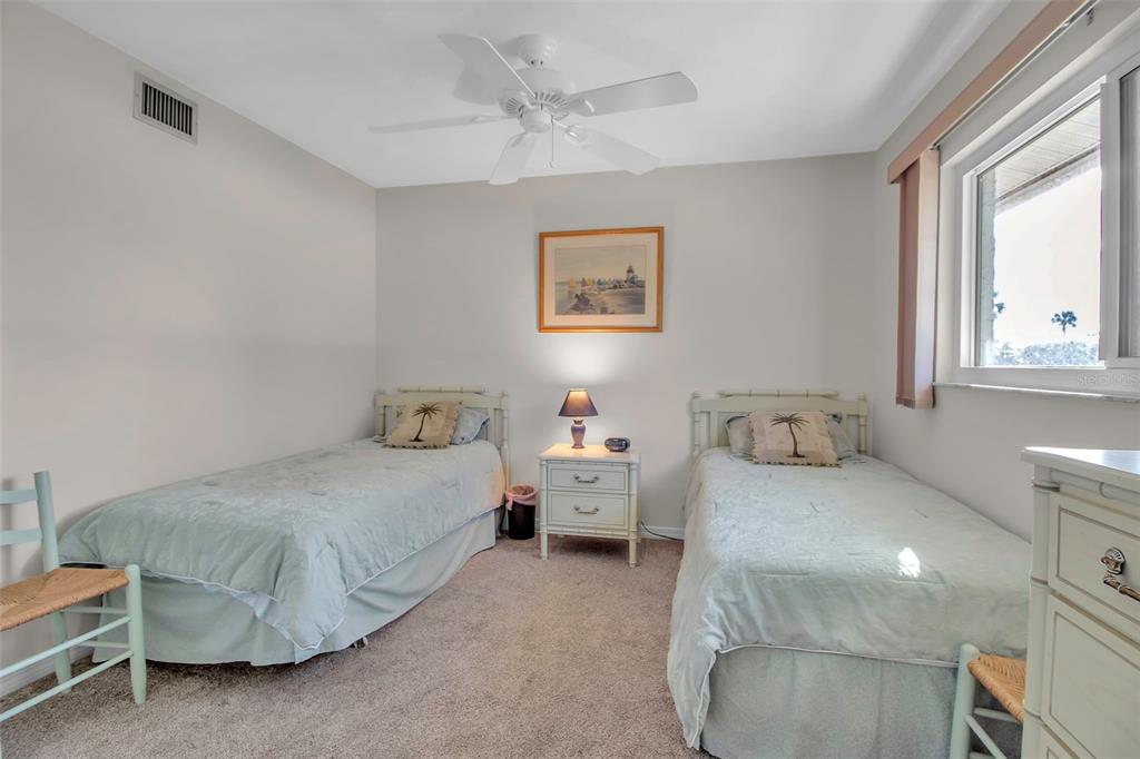 5420 Swift Road, Unit 38 Sarasota, FL 34231 - Photo 21 of 37 a bedroom with a bed and window