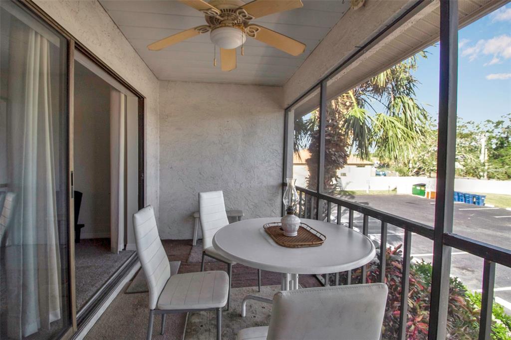 5420 Swift Road, Unit 38 Sarasota, FL 34231 - Photo 34 of 37 a view of a dining room with furniture window and outside view