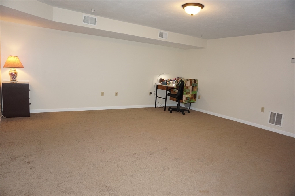 103 Bridle Cross Road, Unit 103 Fitchburg, MA 01420 - Photo 33 of 36 a view of room with window