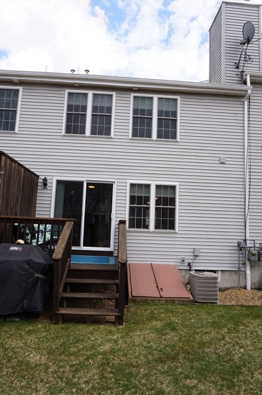 103 Bridle Cross Road, Unit 103 Fitchburg, MA 01420 - Photo 35 of 36 a front view of a house with a yard