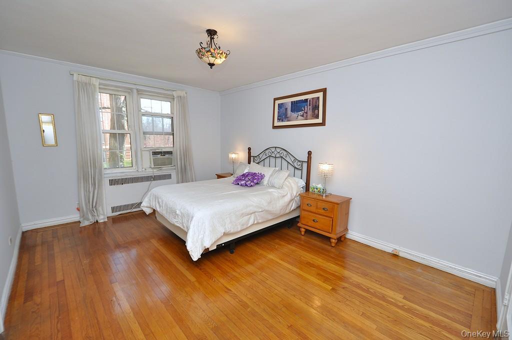 949 Palmer Road, Unit 2G Bronxville, NY 10708 - Photo 18 of 40 a bedroom with a bed and a window