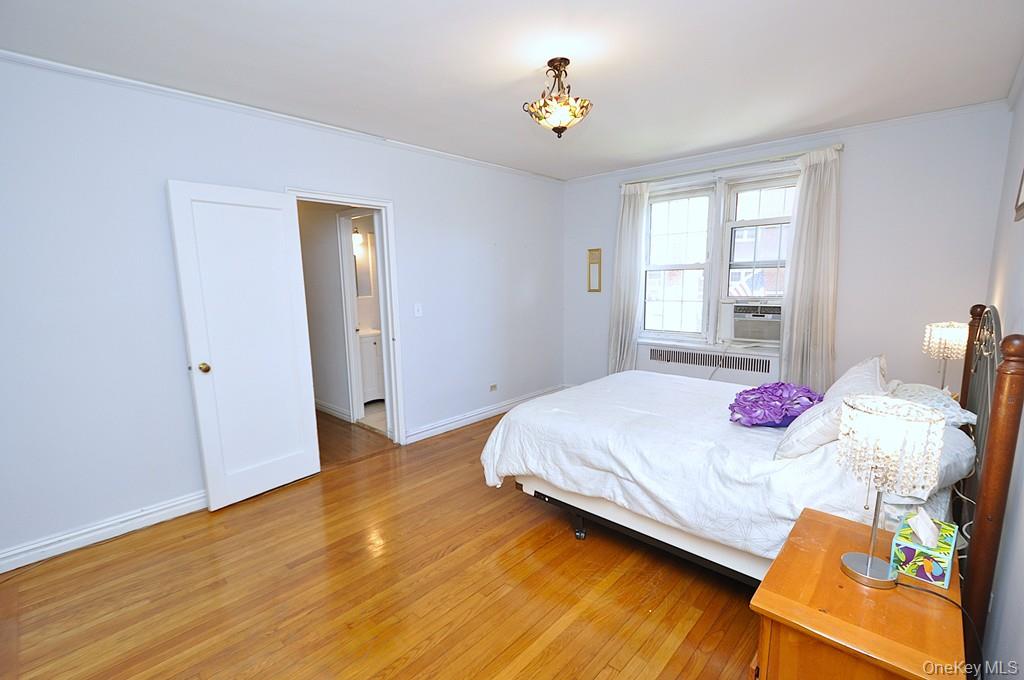 949 Palmer Road, Unit 2G Bronxville, NY 10708 - Photo 20 of 40 a bedroom with a bed and a window