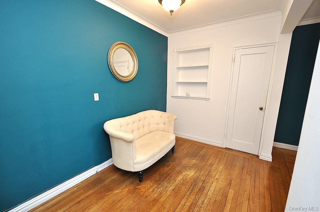 949 Palmer Road, Unit 2G Bronxville, NY 10708 - Photo 26 of 40 a view of a room with wooden floor and window