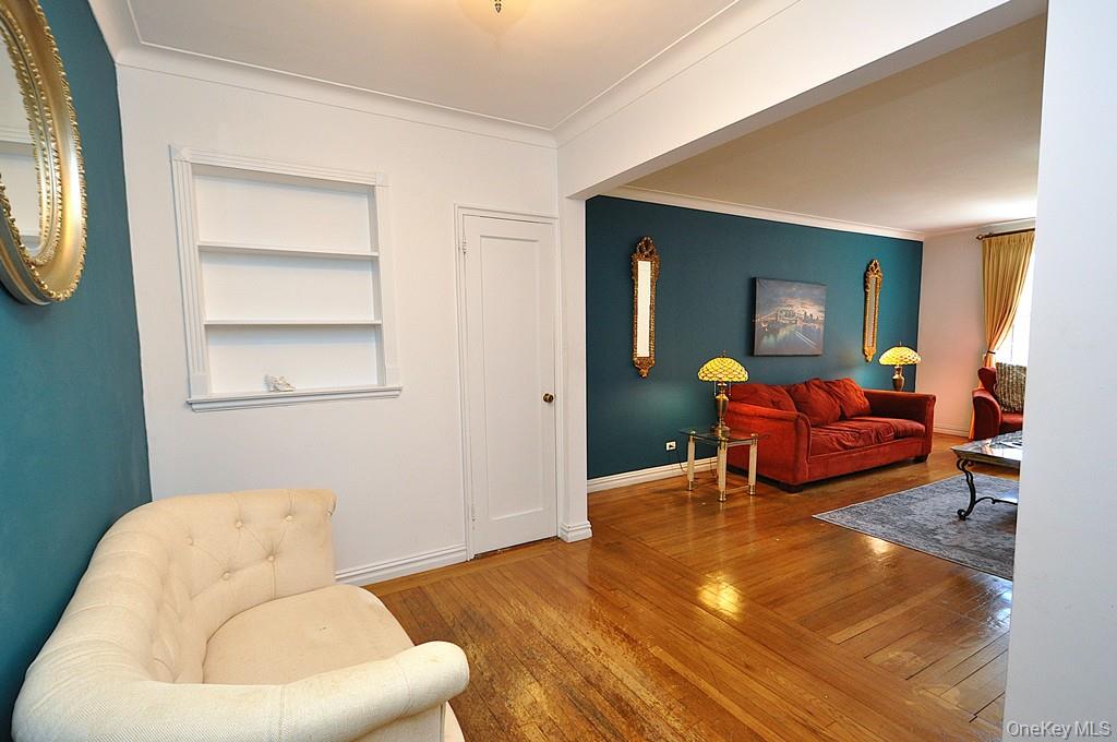 949 Palmer Road, Unit 2G Bronxville, NY 10708 - Photo 27 of 40 a living room with furniture and a large window