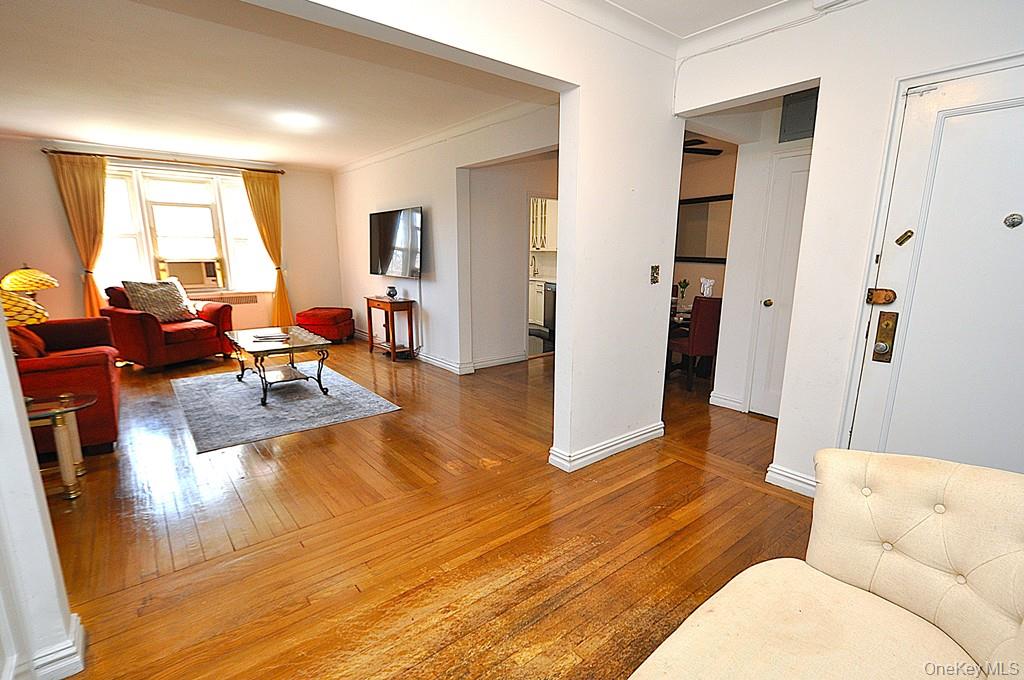 949 Palmer Road, Unit 2G Bronxville, NY 10708 - Photo 28 of 40 a living room with furniture and a large window
