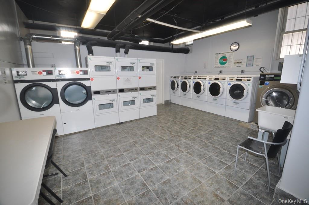 949 Palmer Road, Unit 2G Bronxville, NY 10708 - Photo 30 of 40 a utility room with dryer and washer