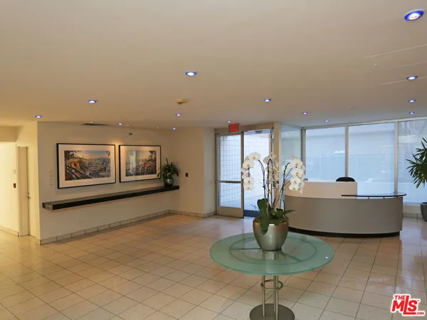 a view of a hallway with a couch