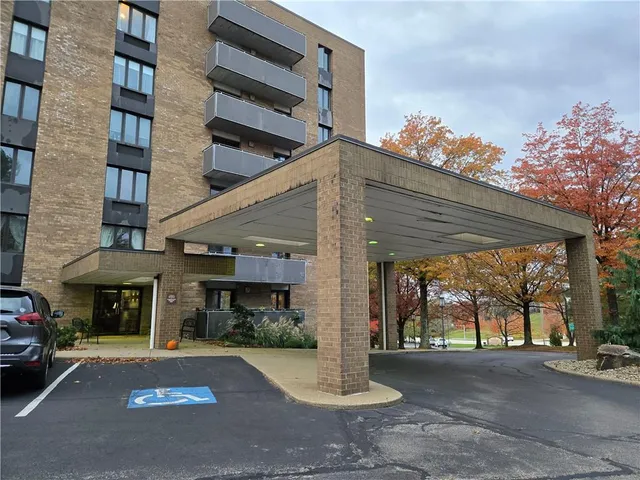 a view of a house with a street