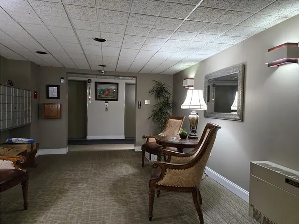 a dining room with a table and chairs