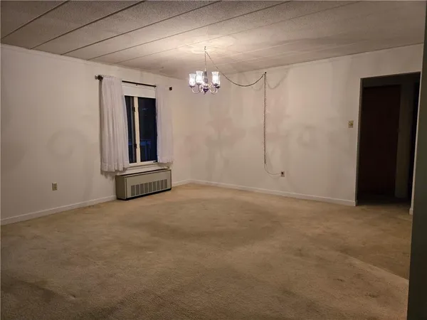 an empty room with window