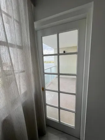 a bathroom with a toilet sink and shower