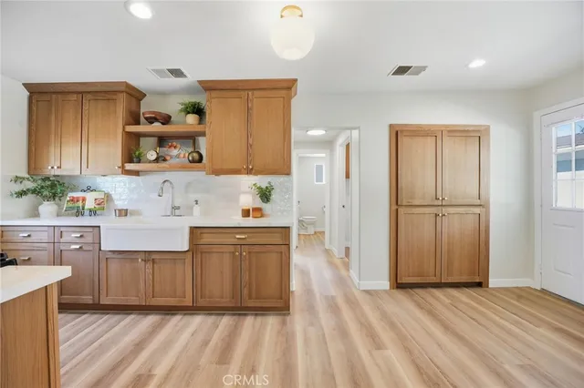 a view of a kitchen from the hallway