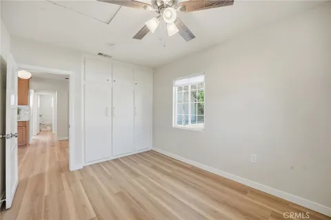 a bathroom with a sink vanity tub and a mirror