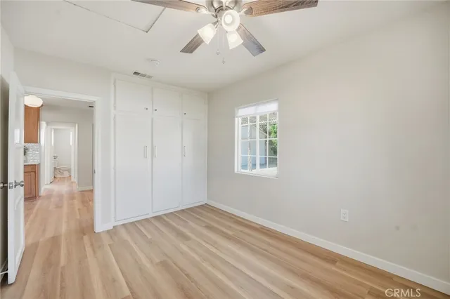 a bathroom with a sink vanity tub and a mirror