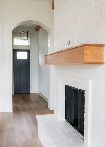 a kitchen with kitchen island stainless steel appliances a sink center island and stove in it