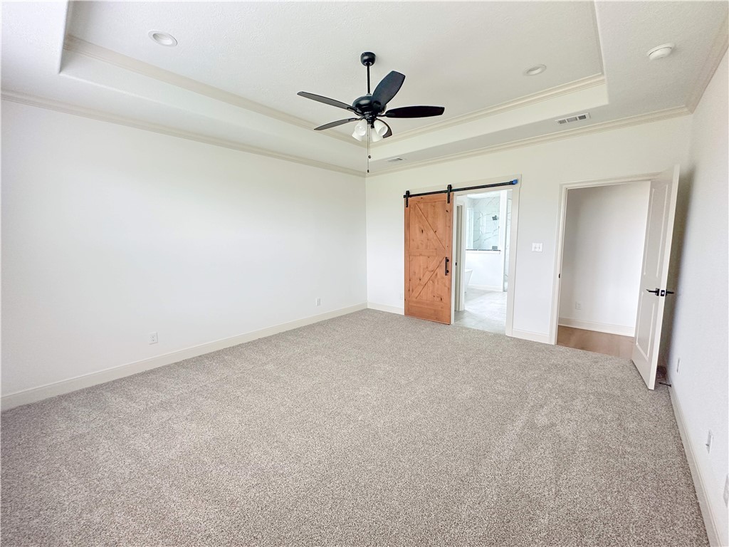 3201 Hunters Crossing Bryan, TX 77808 - Photo 16 of 33 a view of a livingroom with a ceiling fan and window