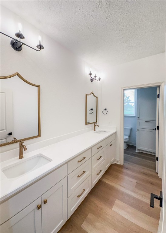 3201 Hunters Crossing Bryan, TX 77808 - Photo 25 of 33 a spacious bathroom with double sink and a mirror