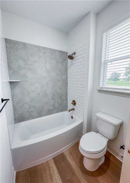 3201 Hunters Crossing Bryan, TX 77808 - Photo 26 of 33 a bathroom with a toilet a sink and bathtub
