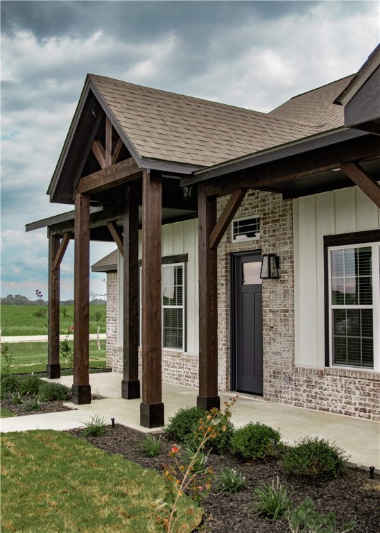 3201 Hunters Crossing Bryan, TX 77808 - Photo 4 of 33 a front view of a house with a yard
