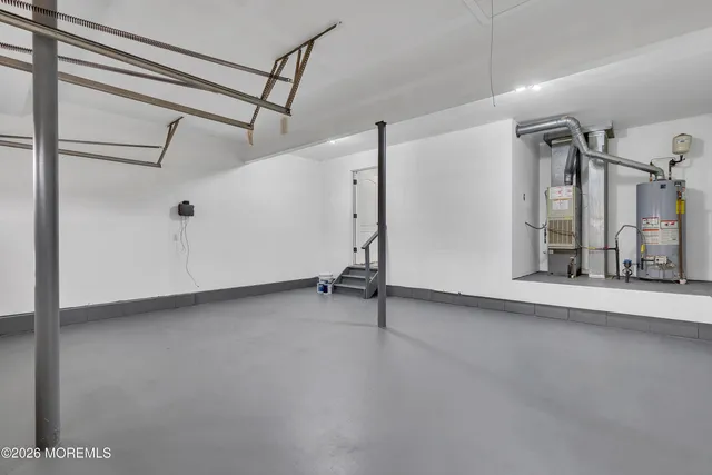 a view of a yard with basketball court