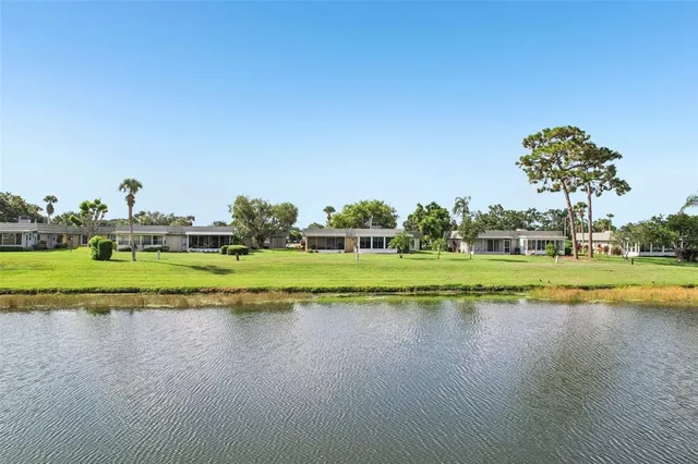a view of a swimming pool and a lake view