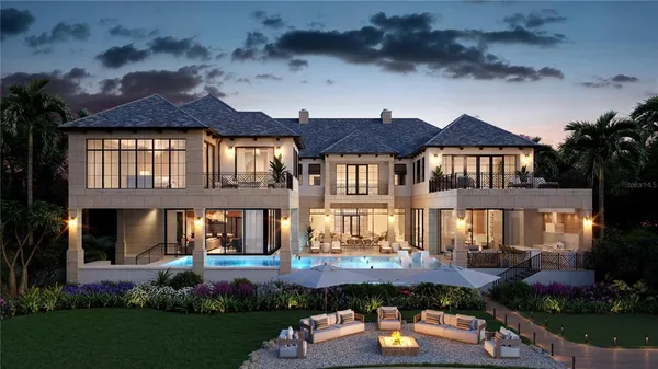 a front view of house and yard with swimming pool and outdoor seating
