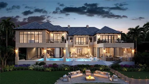 a front view of house and yard with swimming pool and outdoor seating