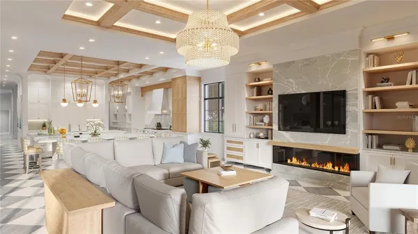 a large living room with stainless steel appliances kitchen island granite countertop furniture and a fireplace