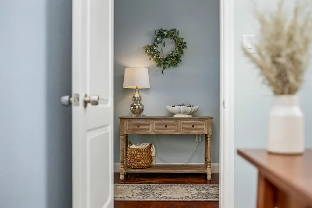 a room with a sink and a mirror