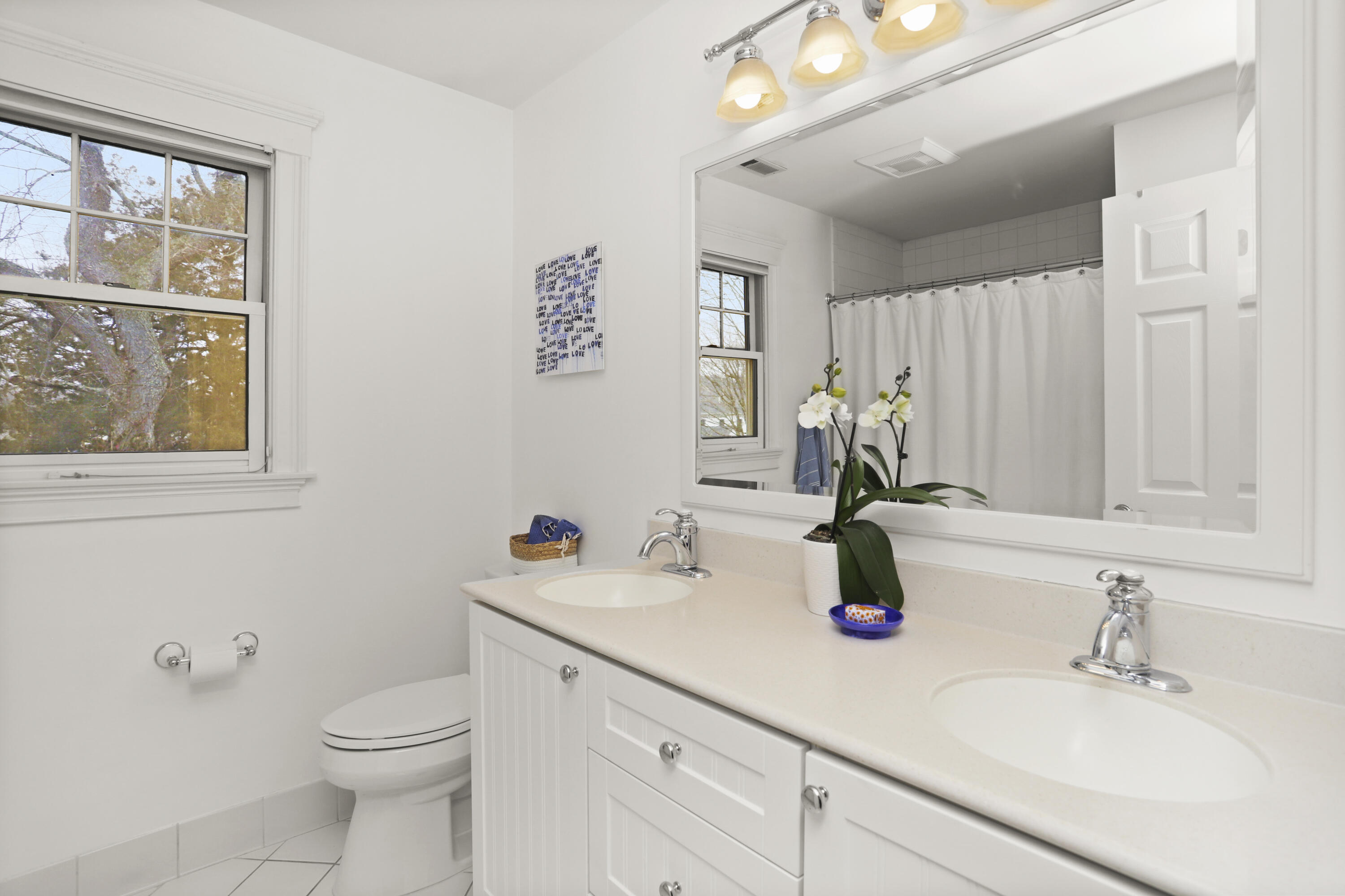 27 A Middlesex Road Darien, CT 06820 - Photo 17 of 27 a bathroom with a sink and a toilet
