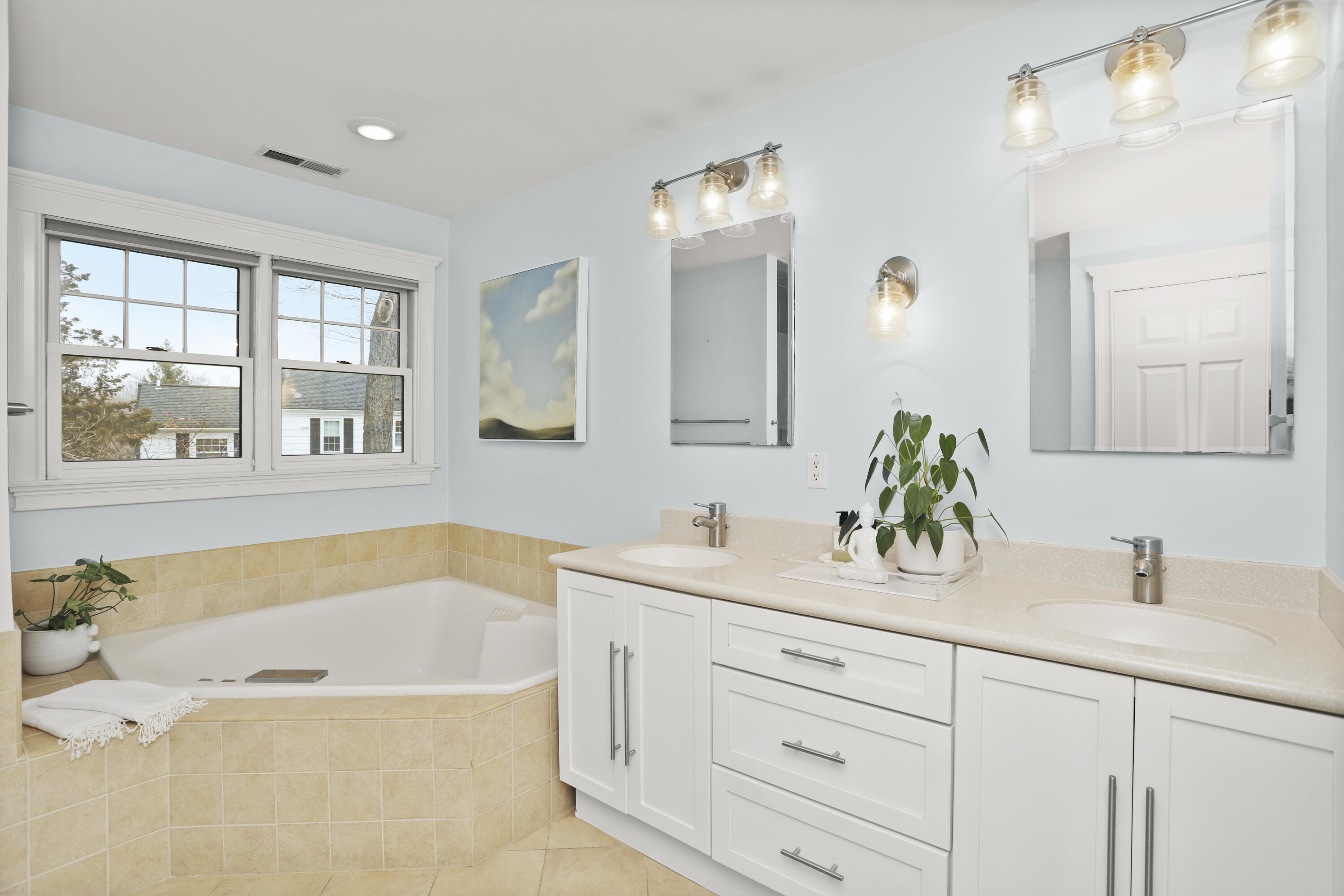 27 A Middlesex Road Darien, CT 06820 - Photo 20 of 27 a bathroom with a tub sink and mirror