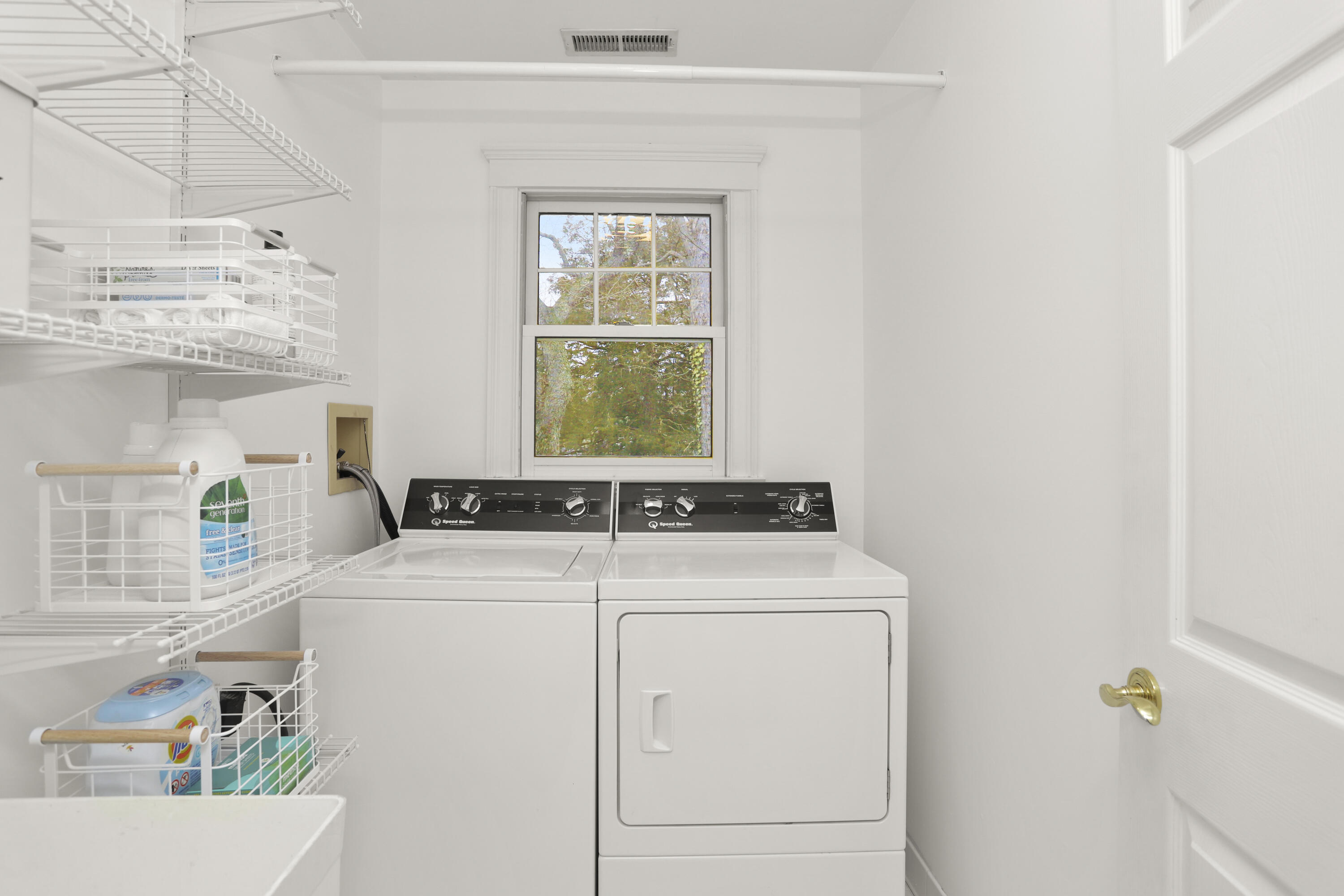 27 A Middlesex Road Darien, CT 06820 - Photo 21 of 27 a view of washer and dryer with kitchen countertops