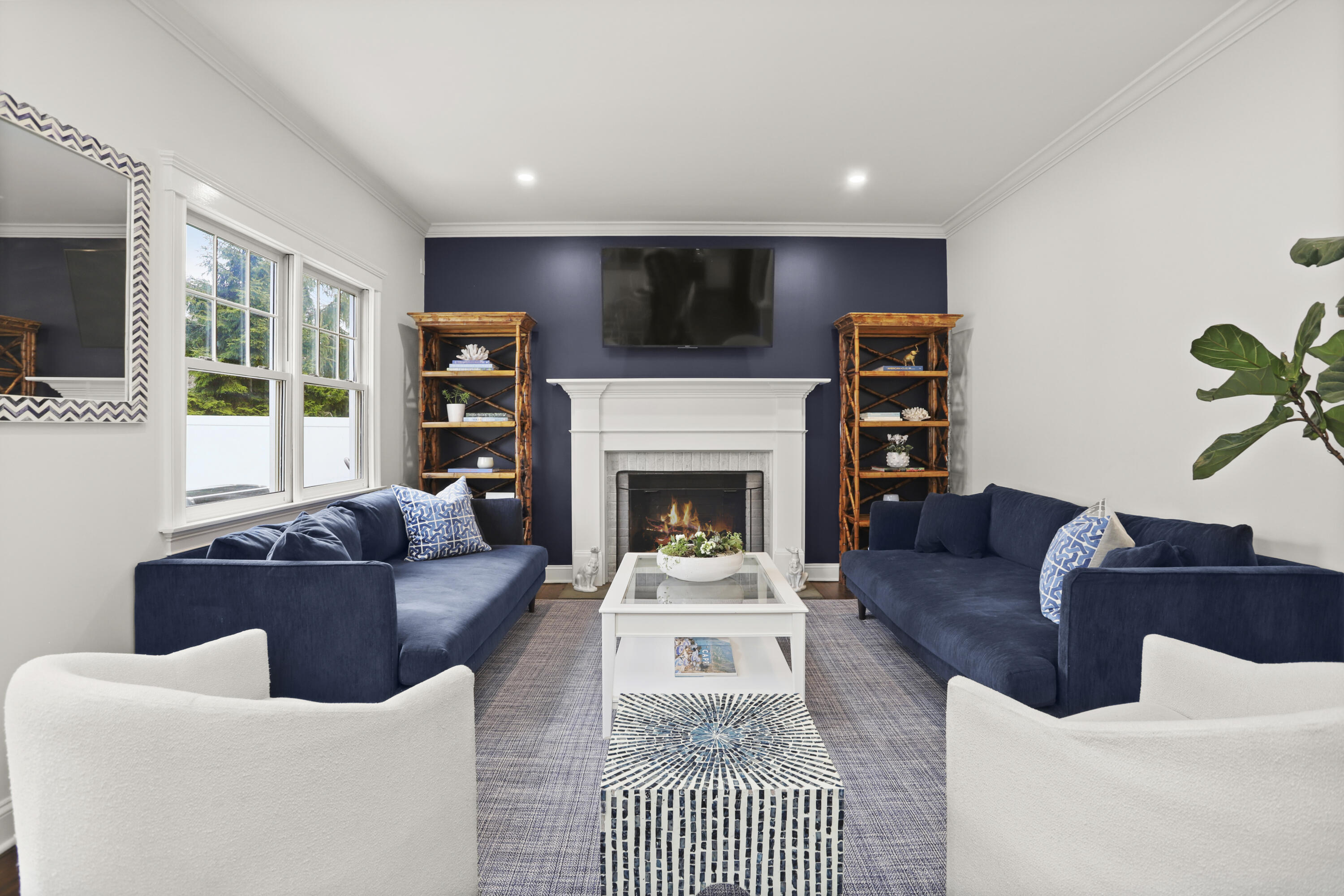 27 A Middlesex Road Darien, CT 06820 - Photo 8 of 27 a living room with furniture and a fireplace