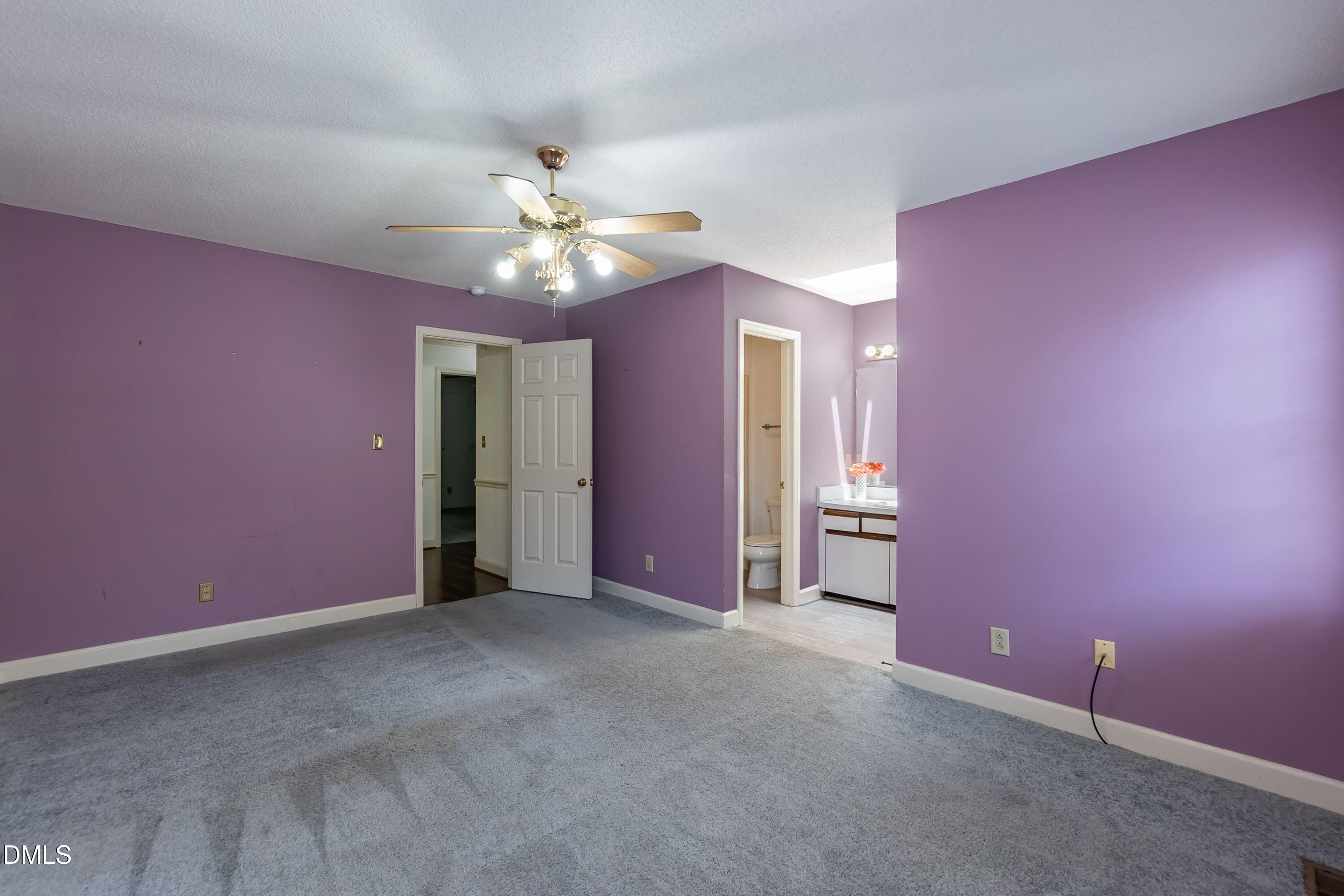 5604 Spring Pines Way Raleigh, NC 27616 - Photo 11 of 22 a view of an empty room with chandelier fan