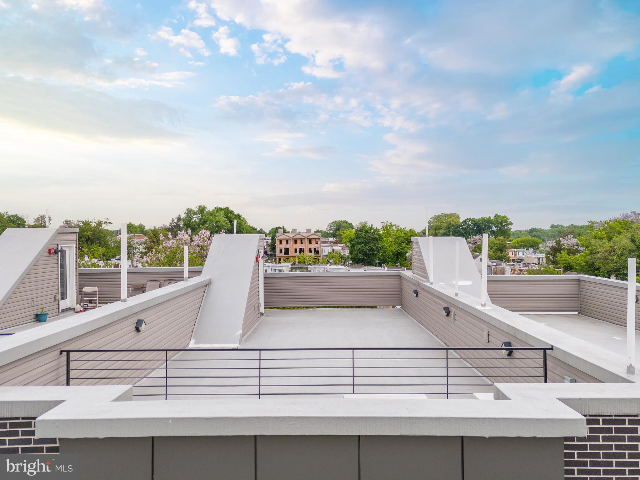 85 East Sharpnack Street Philadelphia, PA 19119 - Photo 11 of 47 a view of roof and city view