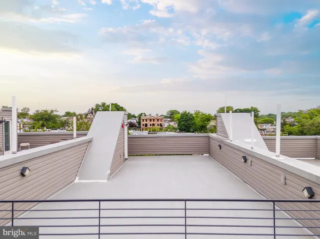 a view of balcony with furniture