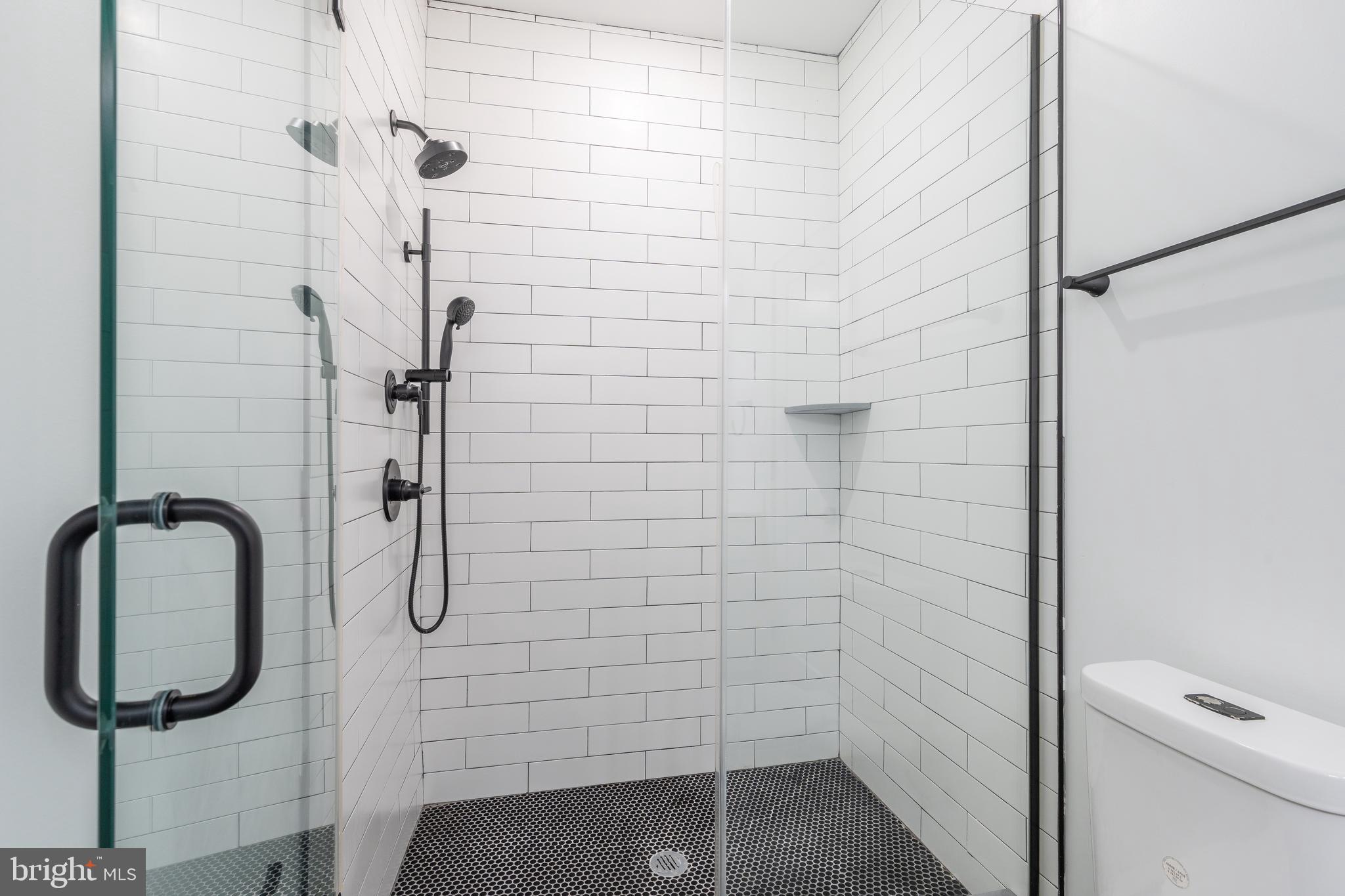 85 East Sharpnack Street Philadelphia, PA 19119 - Photo 40 of 47 a bathroom with a shower