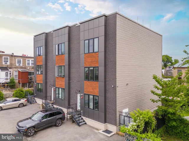 a car parked in front of a house