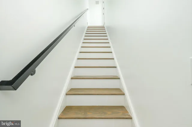 a view of a balcony with hardwood