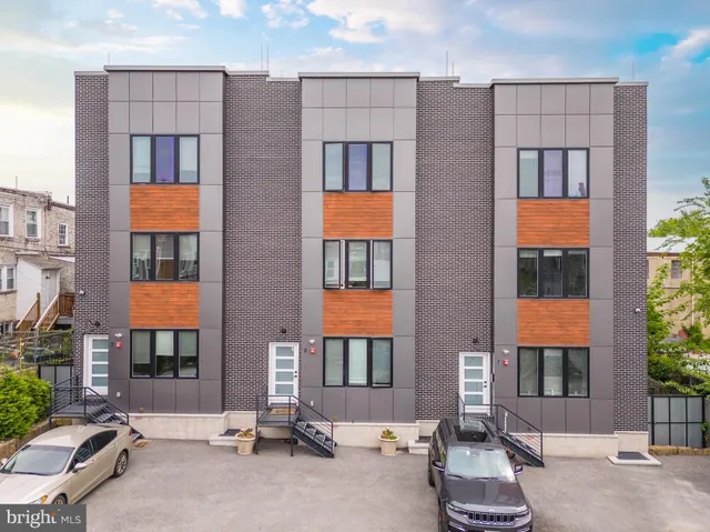 a front view of a building with a outdoor space