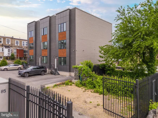 a view of roof and city view