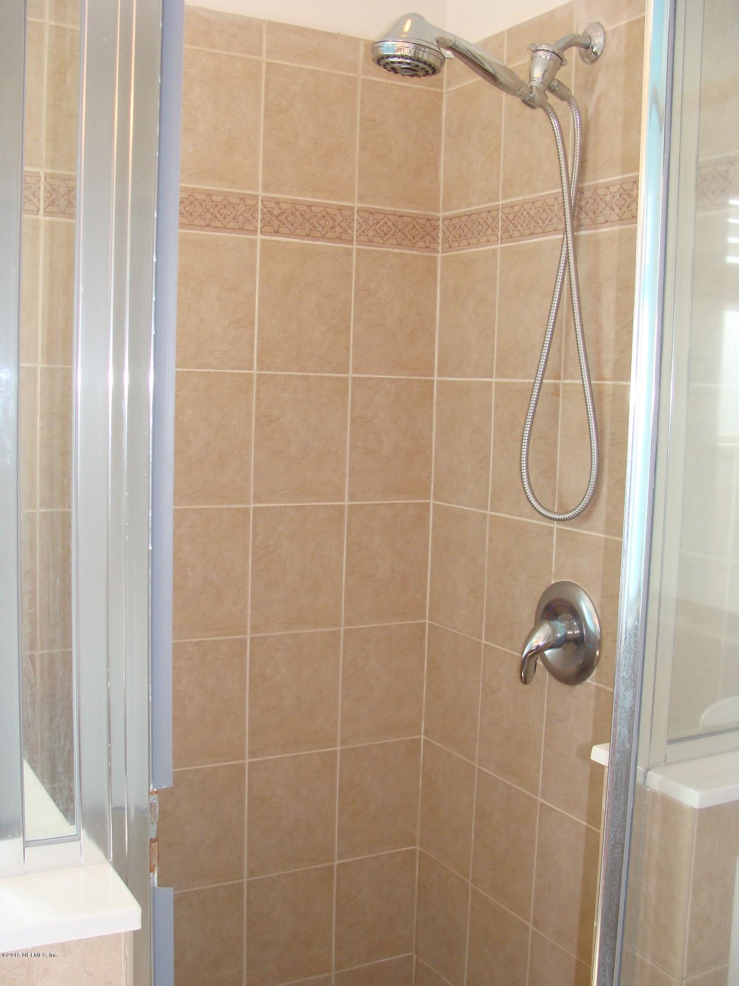 229 Porta Rosa Circle St. Augustine, FL 32092 - Photo 15 of 41 a bathroom that has a shower
