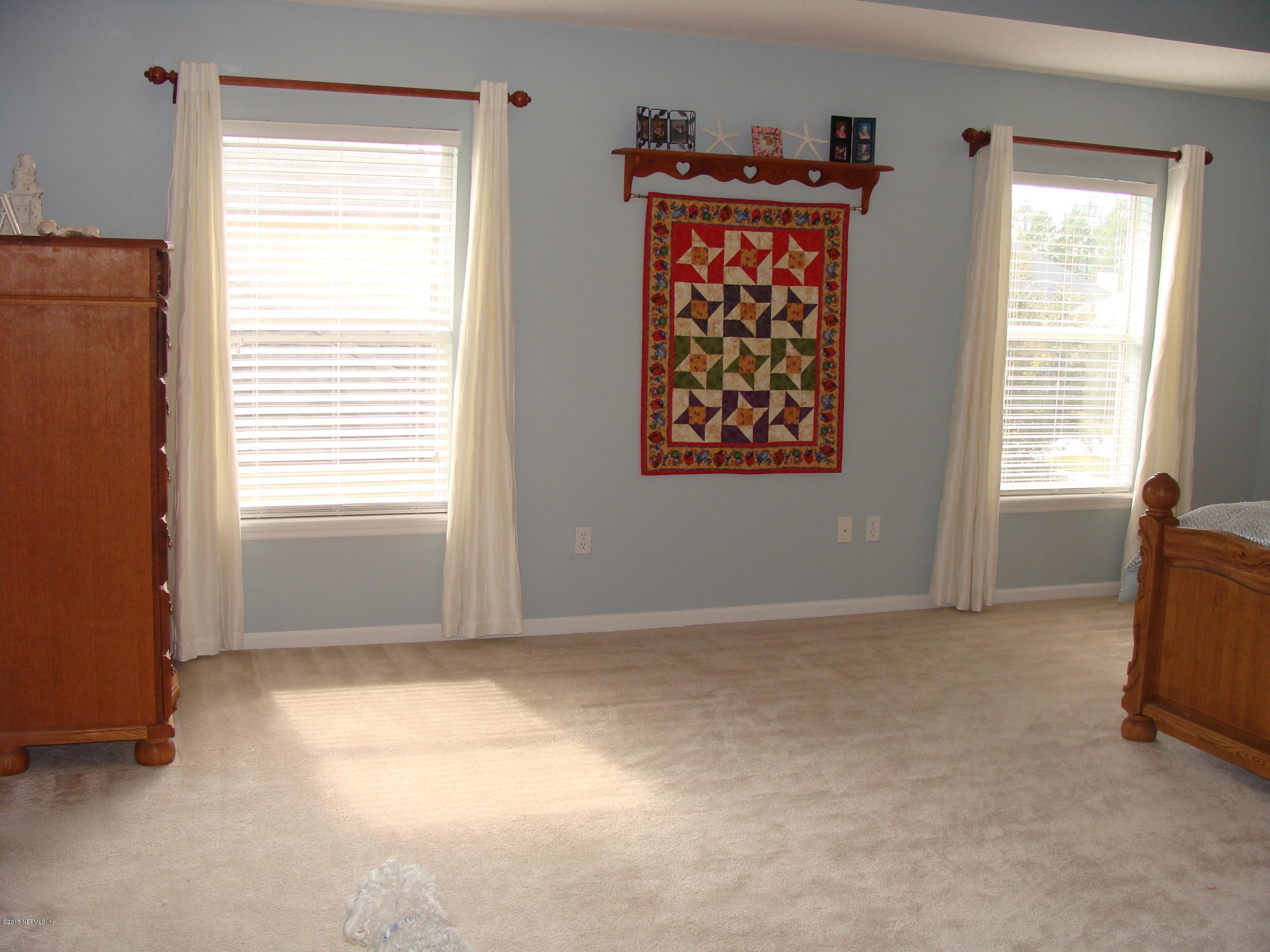 229 Porta Rosa Circle St. Augustine, FL 32092 - Photo 10 of 41 a view of an empty room with a window