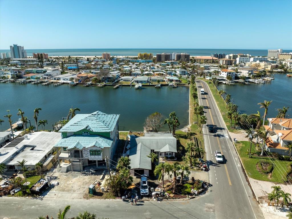11480 4th Street East Treasure Island, FL 33706 - Photo 1 of 1 an aerial view of a house with a ocean view