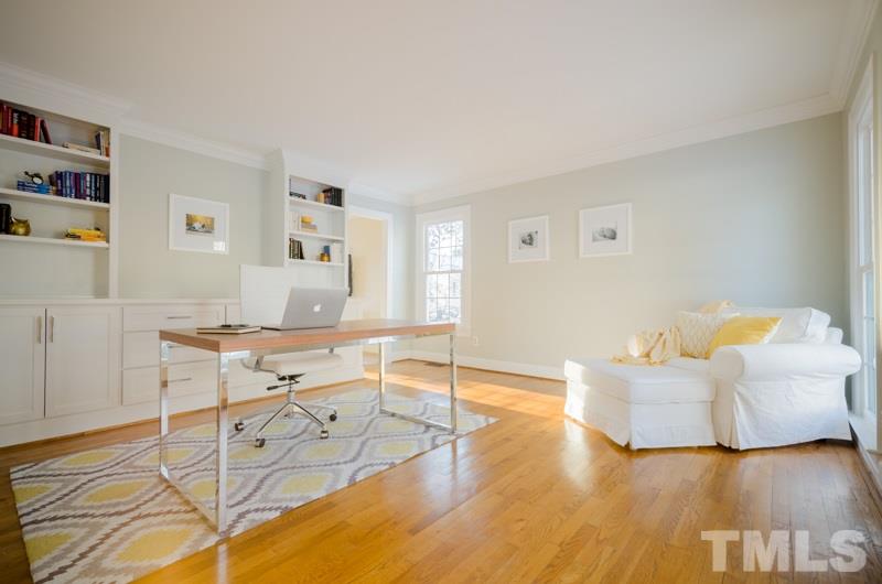 8321 Apple Orchard Way Raleigh, NC 27615 - Photo 2 of 24 a living room with furniture and a wooden floor