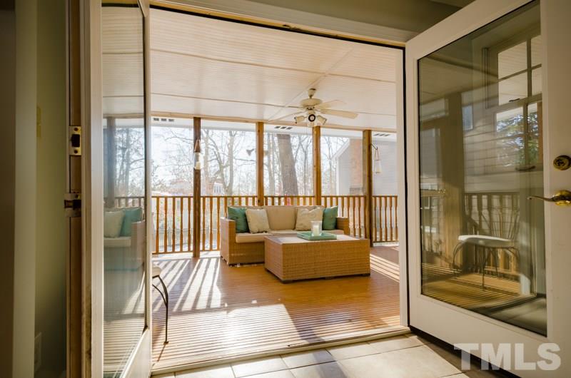 8321 Apple Orchard Way Raleigh, NC 27615 - Photo 23 of 24 a bedroom with furniture and large windows