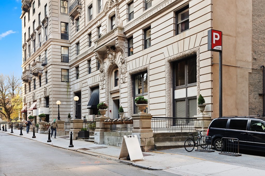 21 Beacon Street, Unit 5D Boston, MA 02108 - Photo 9 of 11 a view of a car park in front of building