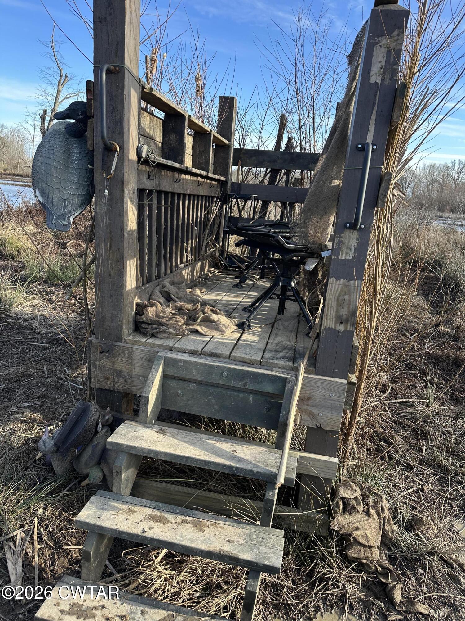 0 Wingo Levee Road Greenfield, TN 38230 - Photo 23 of 34 a roof deck with table and chairs