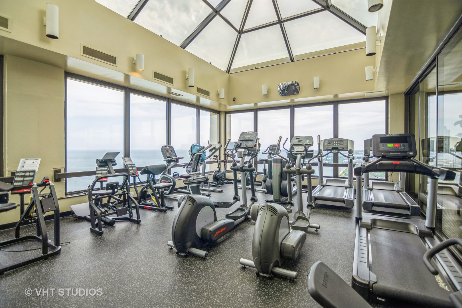 360 East Randolph Street, Unit 308 Chicago, IL 60601 - Photo 18 of 24 a view of a room with gym equipment