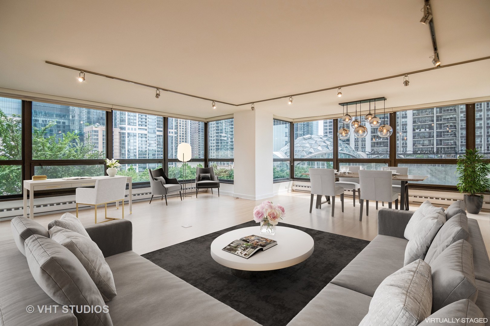 360 East Randolph Street, Unit 308 Chicago, IL 60601 - Photo 2 of 24 a living room with furniture and a table